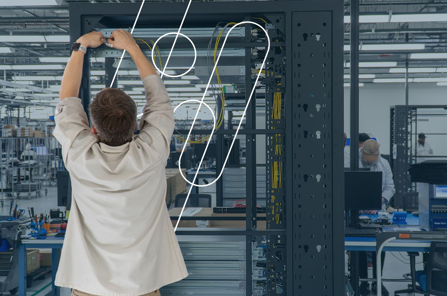 man building a server rack configuration