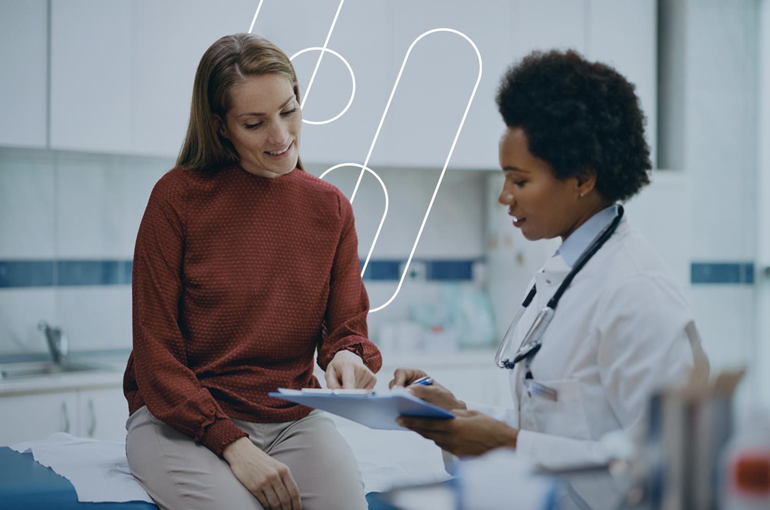 people in healthcare office looking at paperwork