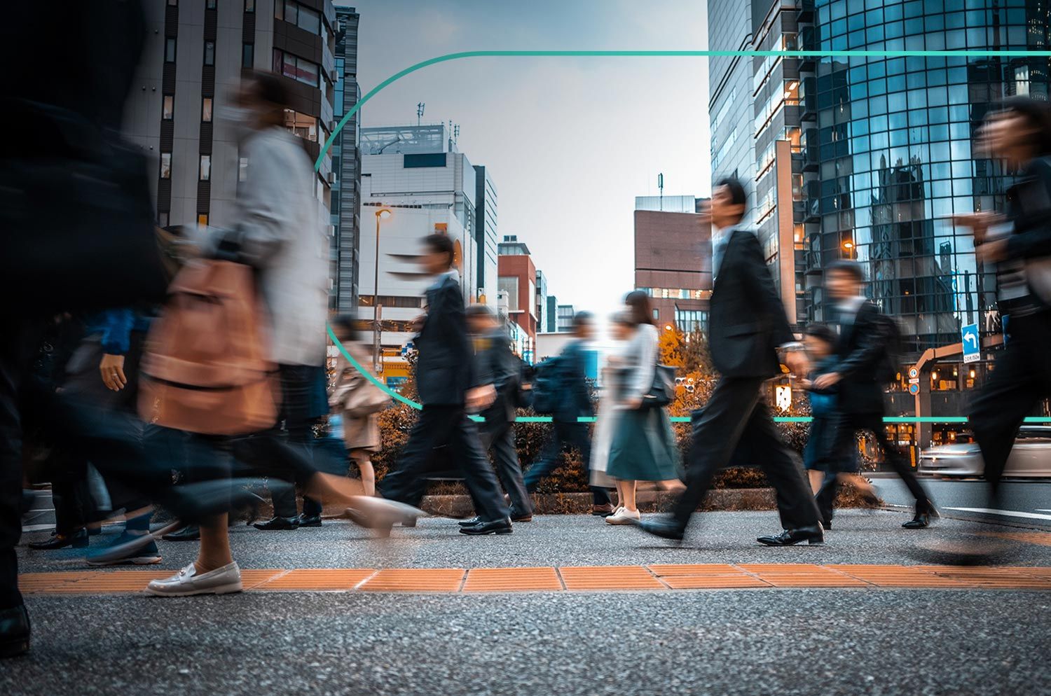 people crossing the street in a large city out of focus