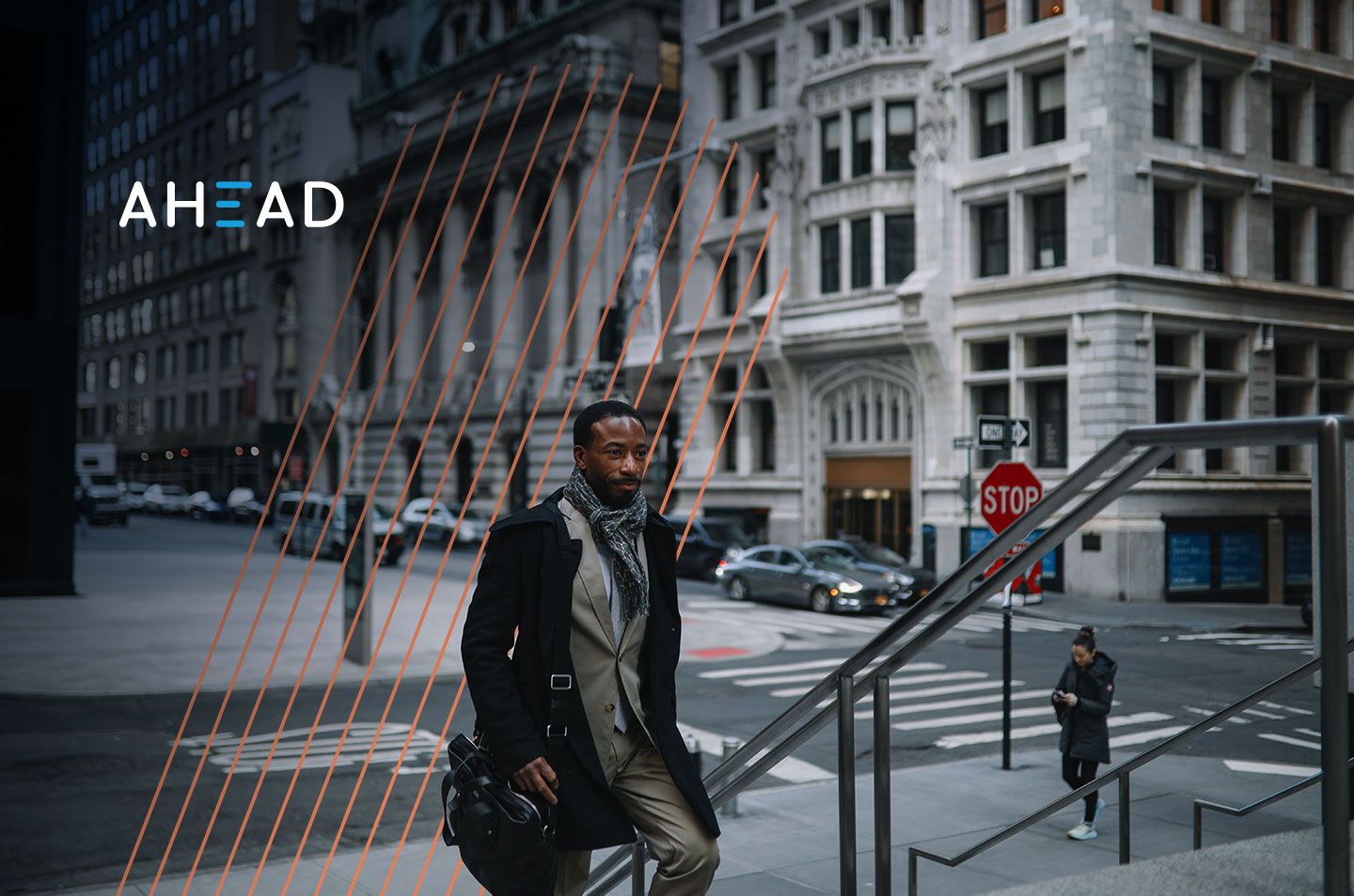 man walking up stairs in the city